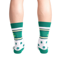 Rear view of model's legs wearing the 100% Lucky socks.
