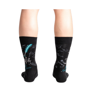 Rear view of a person wearing The Constitution socks, highlighting the quill and ink detail on the back of the socks.