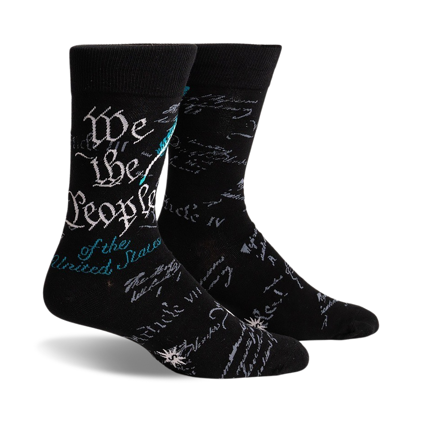 Pair of black crew socks featuring the text of the US Constitution preamble in teal and gray. A quill and ink design is subtly present.