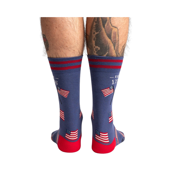 Rear view of Est. 1776 socks, showing the full design detail of the American flags and stripes on the back of the socks.