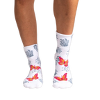 Back view of women's white ankle socks showcasing the butterfly and floral print.