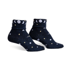 Pair of navy blue sparkly socks with white and yellow stars, moons, and the phrase 'Just a Phase' on the cuff.