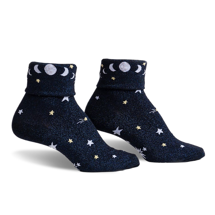 pair of blue socks with white crescent moons and yellow stars. the socks are laying flat, side by side, on a white background.