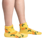 Lifestyle shot showing the Simply the Zest! socks on a person's legs, highlighting how they look when worn.