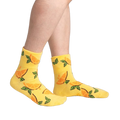 Another lifestyle shot showcasing the socks on a person's legs from a different angle.