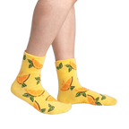 Another lifestyle shot showcasing the socks on a person's legs from a different angle.