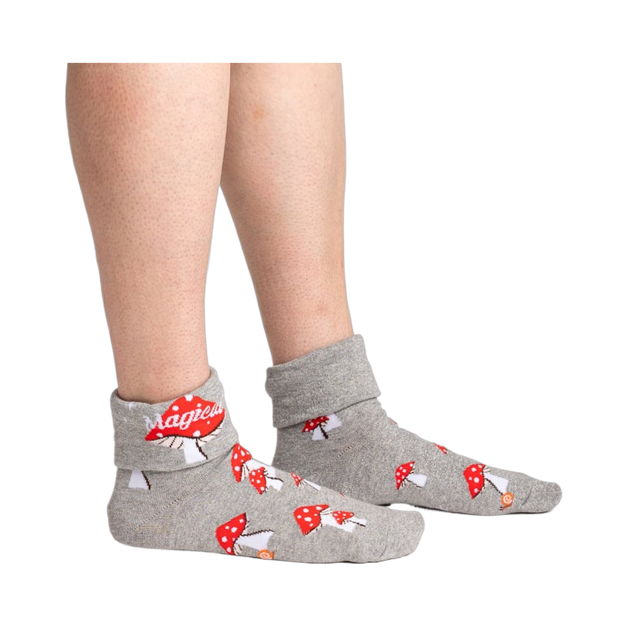 Lifestyle shot showing the socks on a person's legs, showcasing the fit and style of the 'Magical! Turn Cuff' socks.