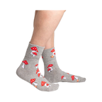 Lifestyle shot showcasing the socks on a person's feet, highlighting the shimmery fabric and mushroom design.