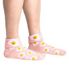 Lifestyle shot showing the socks on a person's legs, showcasing the fit and style.