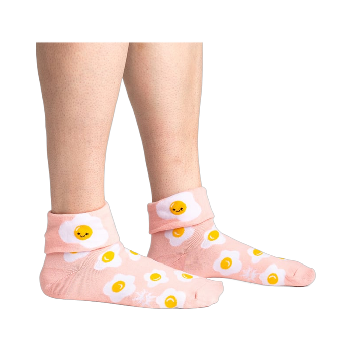 Lifestyle shot showing the socks on a person's legs, showcasing the fit and style.