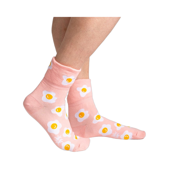 Another lifestyle shot showing the socks on a person's legs from a different angle.