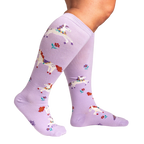 Lifestyle shot showing the lavender unicorn socks on a person's legs, highlighting the extra stretch.
