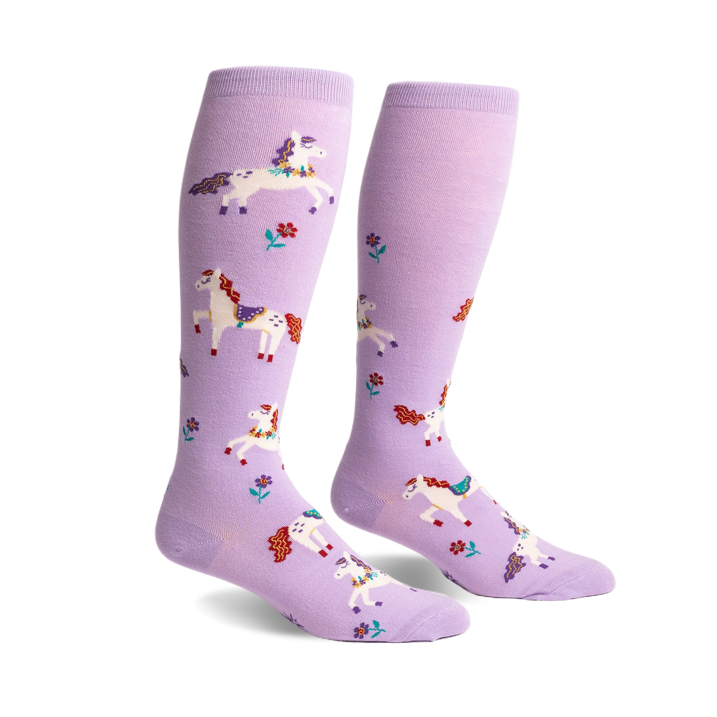 Pair of lavender knee-high socks with a whimsical design of prancing white unicorns and small flowers.