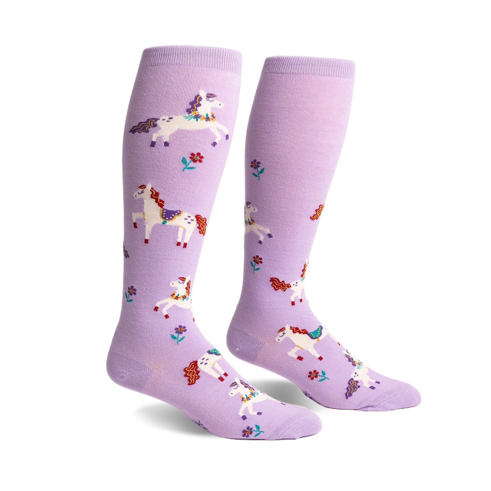 Pair of lavender knee-high socks with a whimsical design of prancing white unicorns and small flowers.