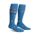 Pair of blue knee-high socks.  Rainbow 'Queer Joy' text and yellow star pattern.