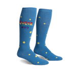 Pair of blue knee-high socks.  Rainbow 'Queer Joy' text and yellow star pattern.