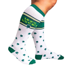 Lifestyle shot showing a person's legs wearing the '100% Lucky' knee-high socks, highlighting their fit and stretch.