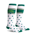 Pair of white knee-high socks with green shamrock pattern, green stripes, and '100% Lucky' text.