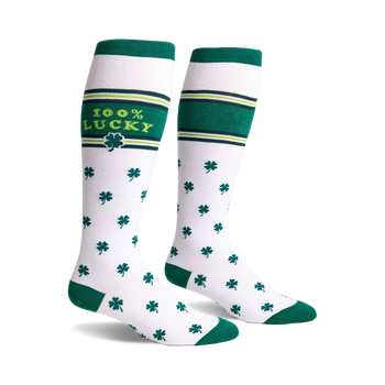 Pair of white knee-high socks with green shamrock pattern, green stripes, and '100% Lucky' text.