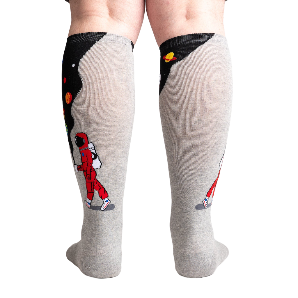 Rear view of the socks showing the full design on both socks. The grey and black space theme is visible.