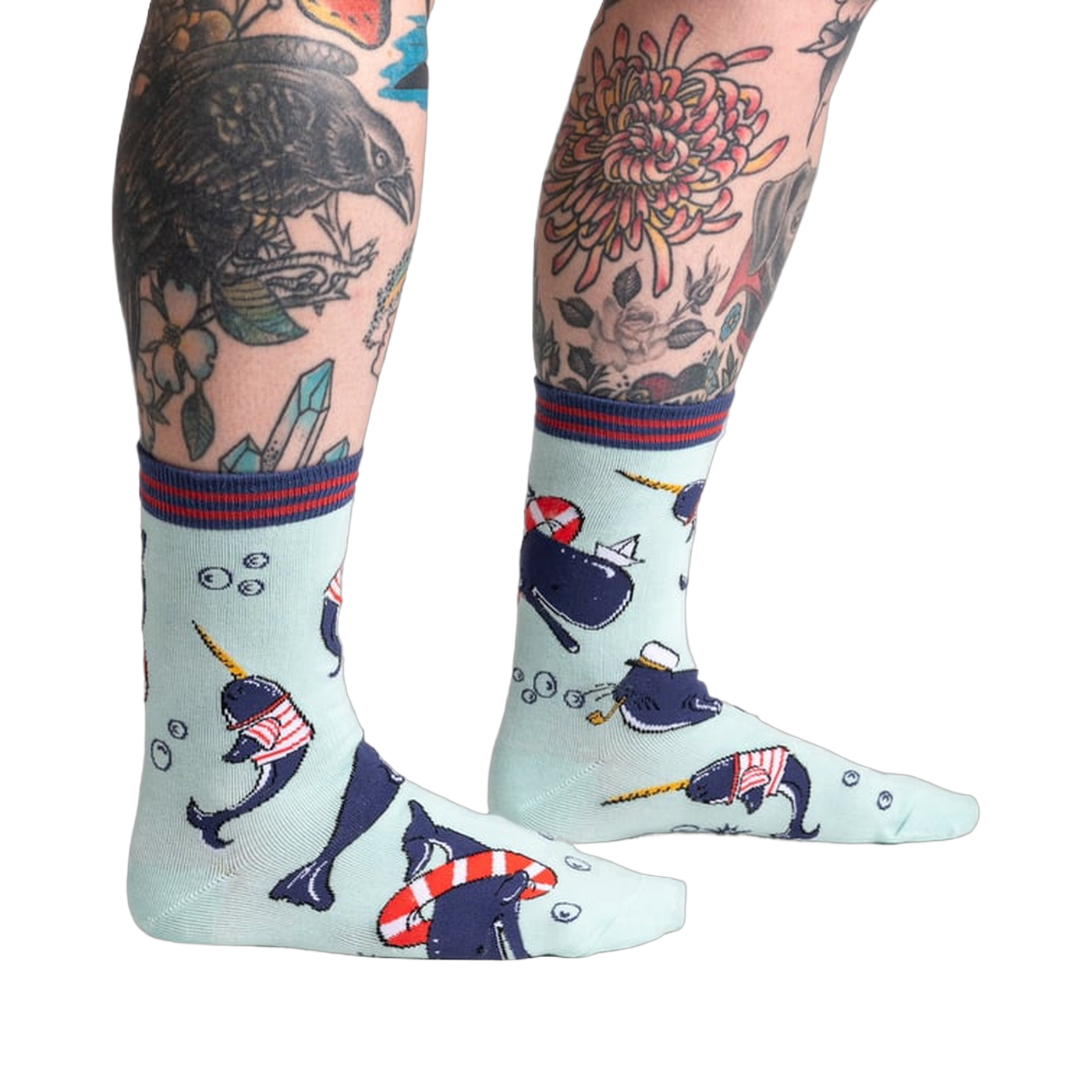 Lifestyle photo showing Whale-y Good Time socks on a model's legs, showcasing the sock's design and fit.