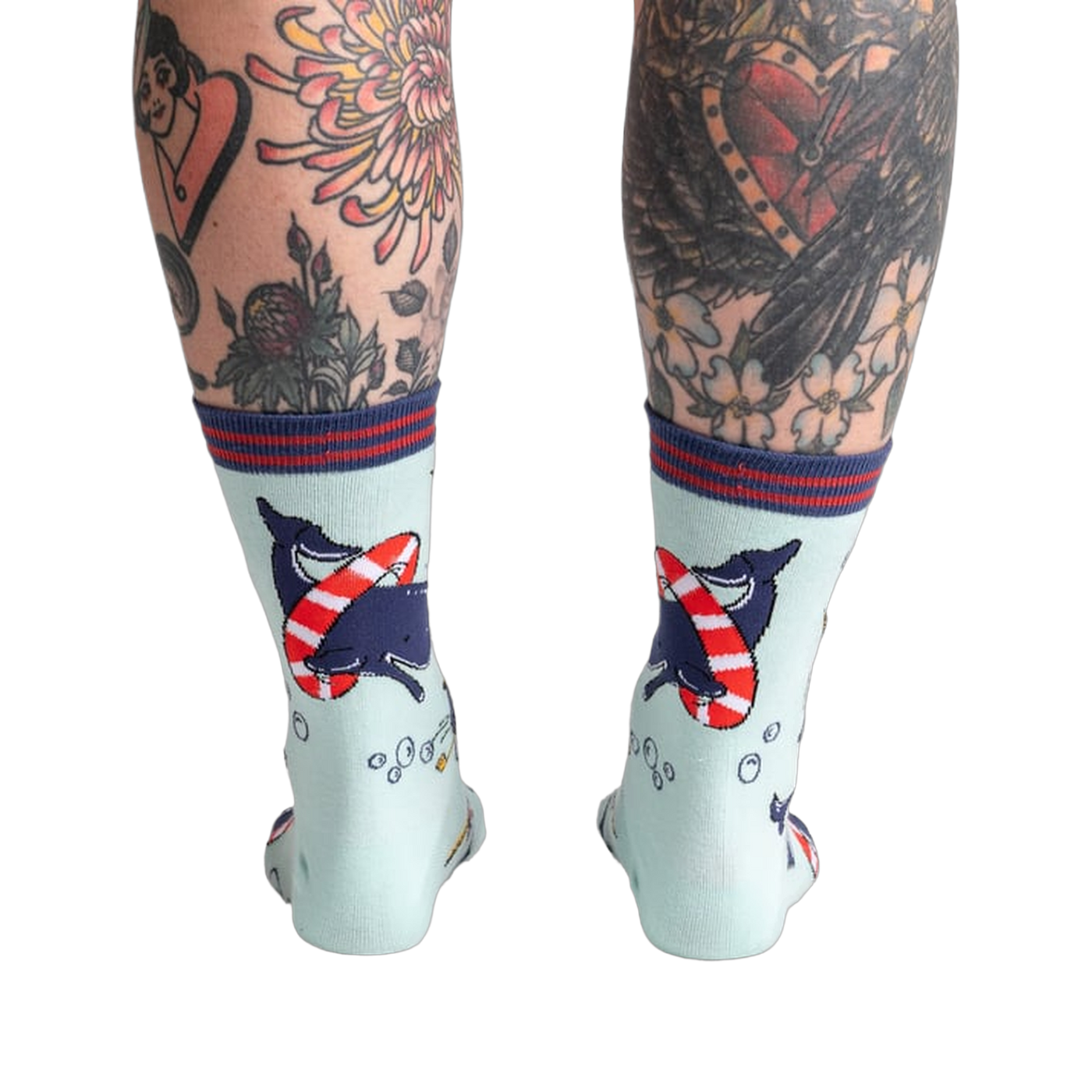 Back view of Whale-y Good Time socks on a model's legs, highlighting the design details on the back of the socks.