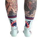 Back view of Whale-y Good Time socks on a model's legs, highlighting the design details on the back of the socks.