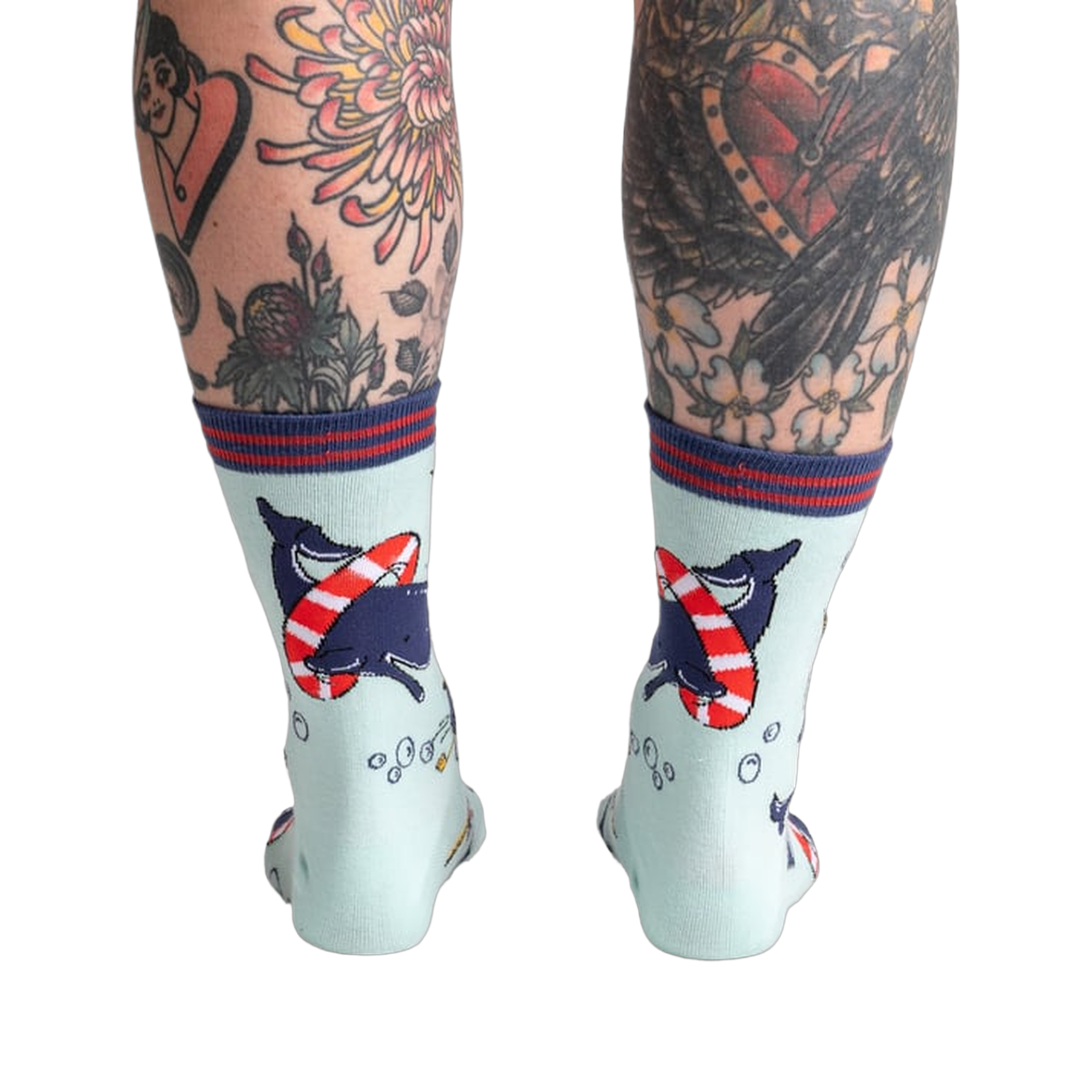 Back view of Whale-y Good Time socks on a model's legs, highlighting the design details on the back of the socks.