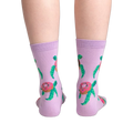 Back view of the same socks, showing the donut-turtle pattern.