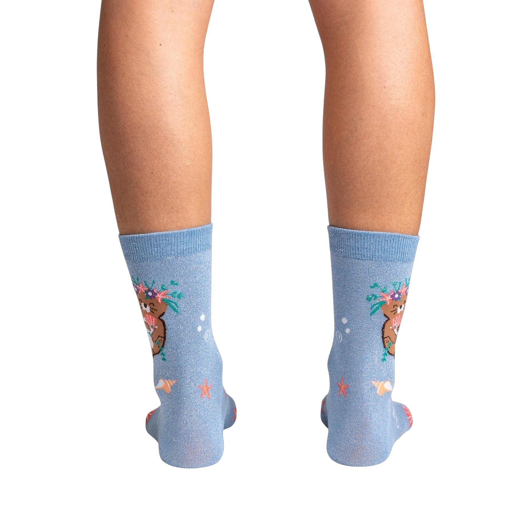 Rear view of the socks on a model's legs against a black background, showcasing the full design.