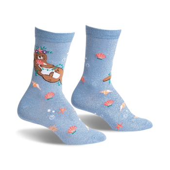  blue crew socks for women featuring cartoon otters wearing flower crowns and holding starfish.   