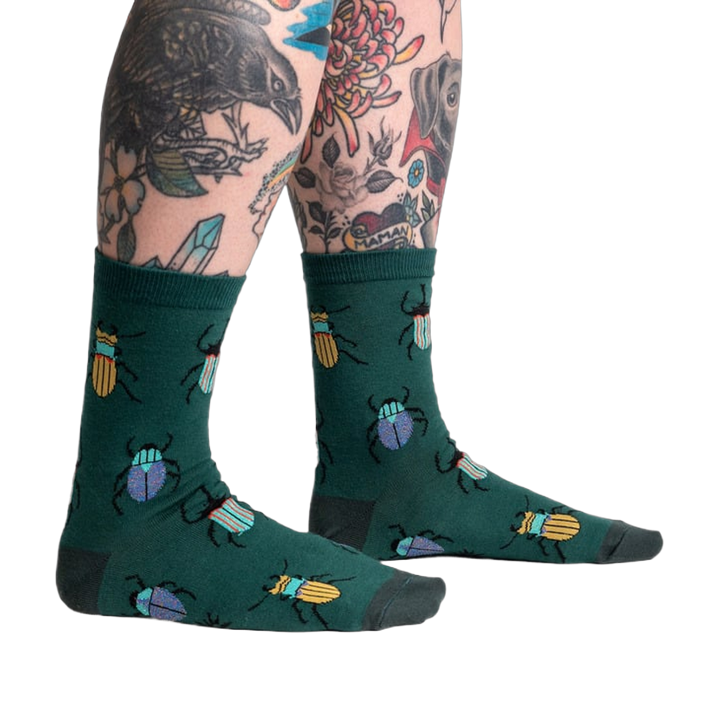 Lifestyle shot: Beetle-Mania! socks on a model's legs, showcasing the fit and design.