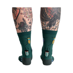 Back view of the socks highlighting the beetle pattern on the back of the leg.