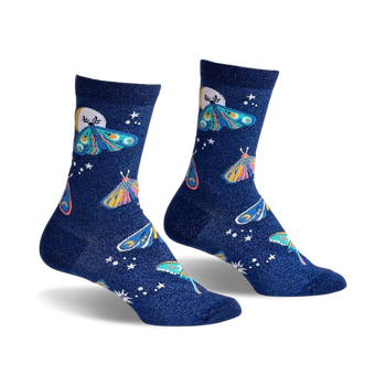 crew-length socks in dark blue feature a captivating pattern of intricately detailed multi-colored moths and scattered stars for women.  
