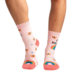 A pair of pink socks with the word 