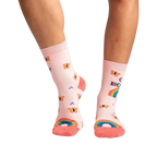 Lifestyle shot showing the socks on a model's legs, highlighting the fit and overall look.
