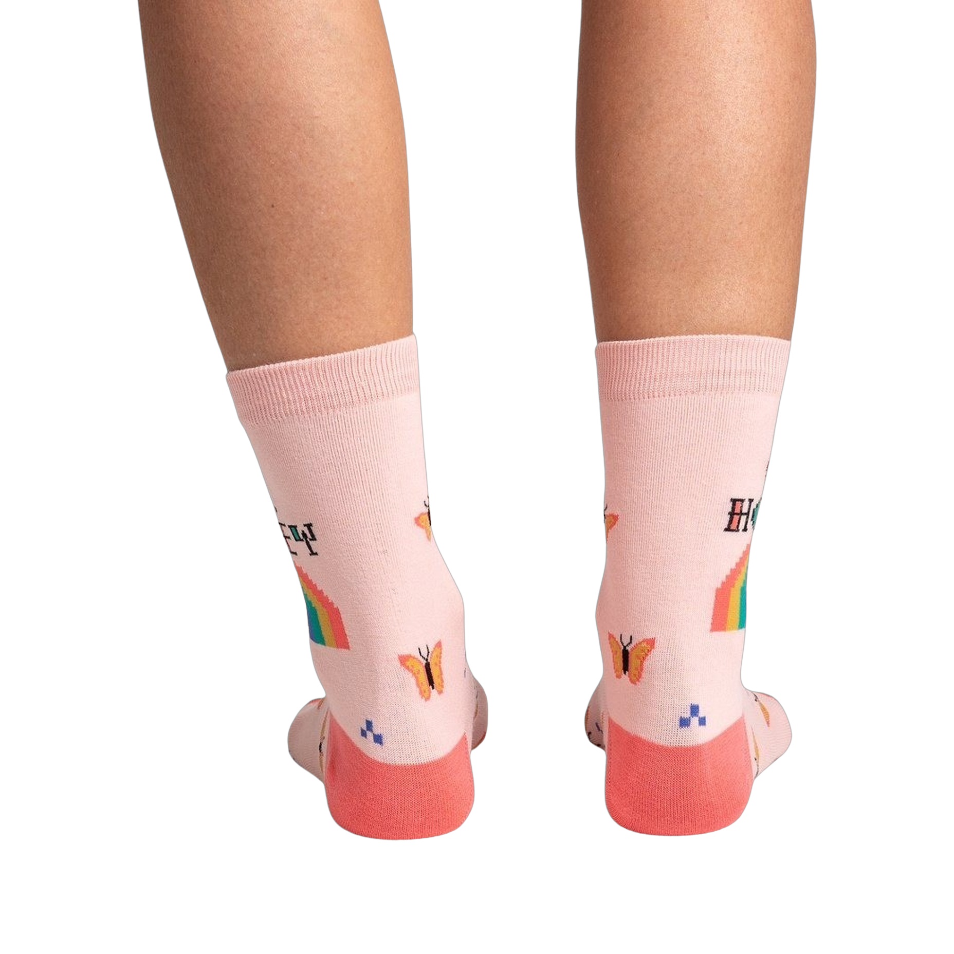 Back view of the socks on a model's legs, showcasing the design details on the back of the socks.