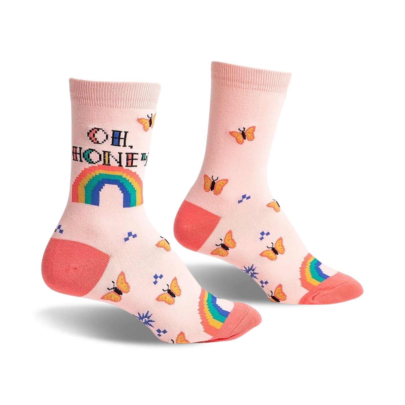 Pair of pastel pink crew socks with an 'Oh, Honey' pixelated message, rainbow, and orange butterflies.