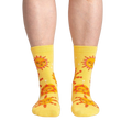 Lifestyle shot showing the socks on a person's legs, showcasing how they look when worn.