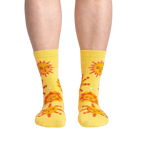 Lifestyle shot showing the socks on a person's legs, showcasing how they look when worn.