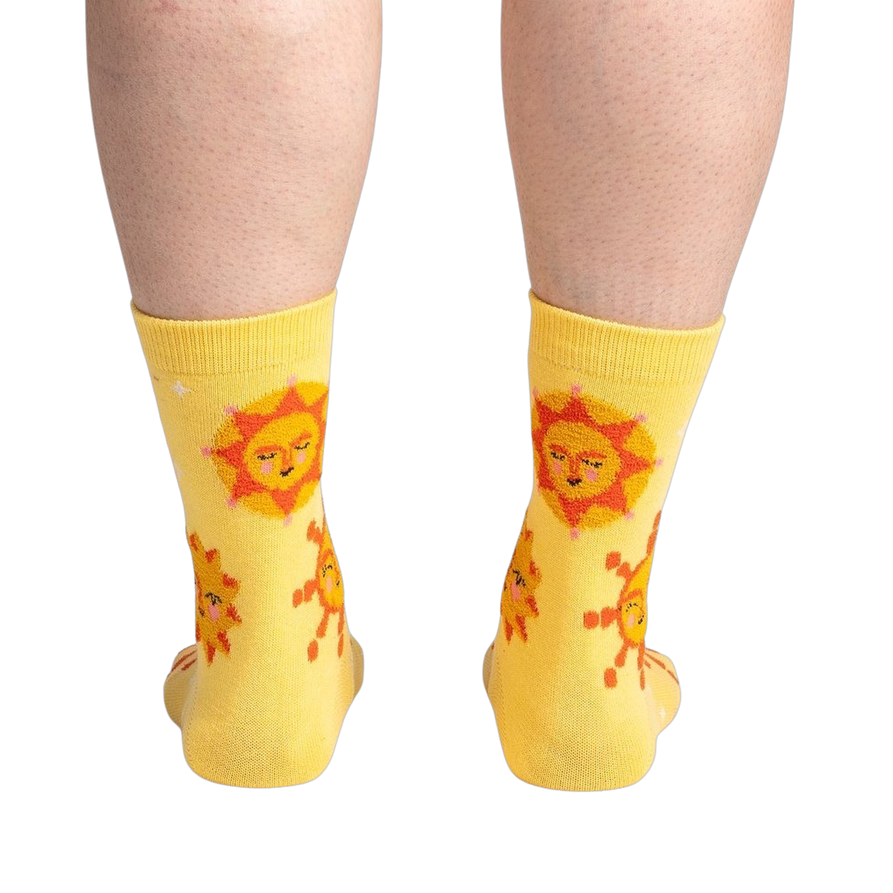 Rear view of the socks on a person's legs, highlighting the back design and fit.
