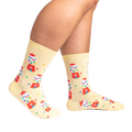 Lifestyle shot showing 'I Chews You' socks on a person's legs.