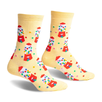 front view of a pair of yellow socks with a gumball machine pattern.