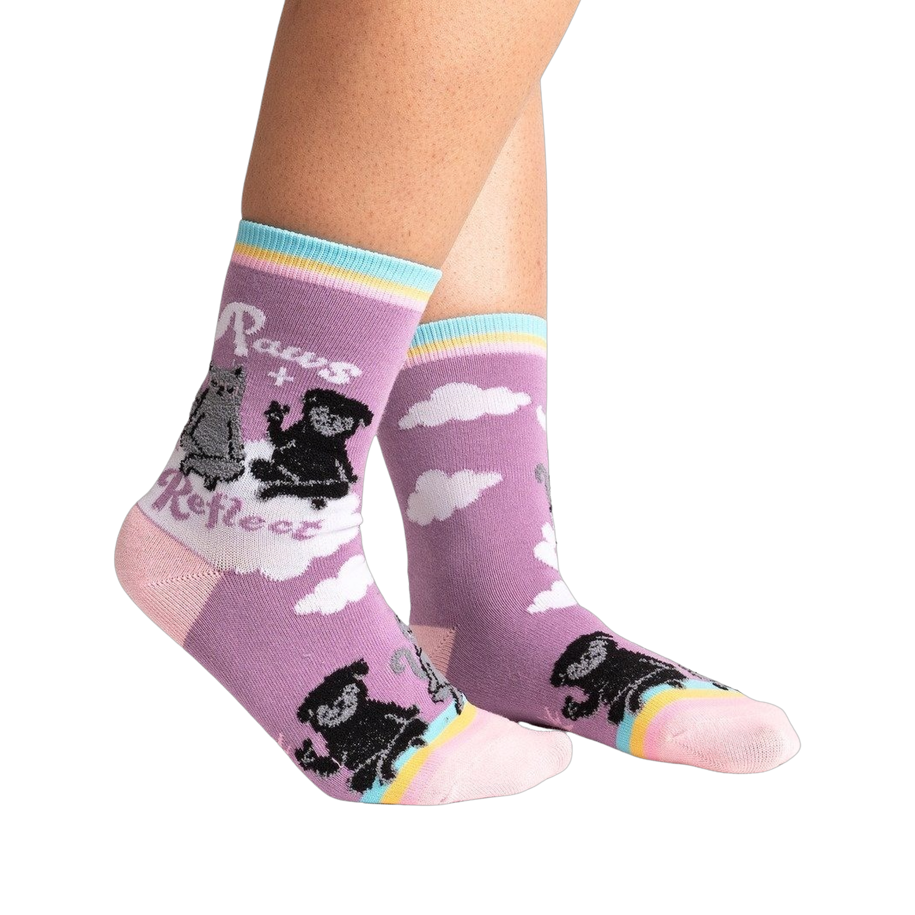 Lifestyle shot of Paws + Reflect socks on a person's legs, showcasing the sock's fit and design.