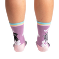 Rear view of Paws + Reflect socks, highlighting the full design on the back of the socks.