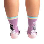Rear view of Paws + Reflect socks, highlighting the full design on the back of the socks.