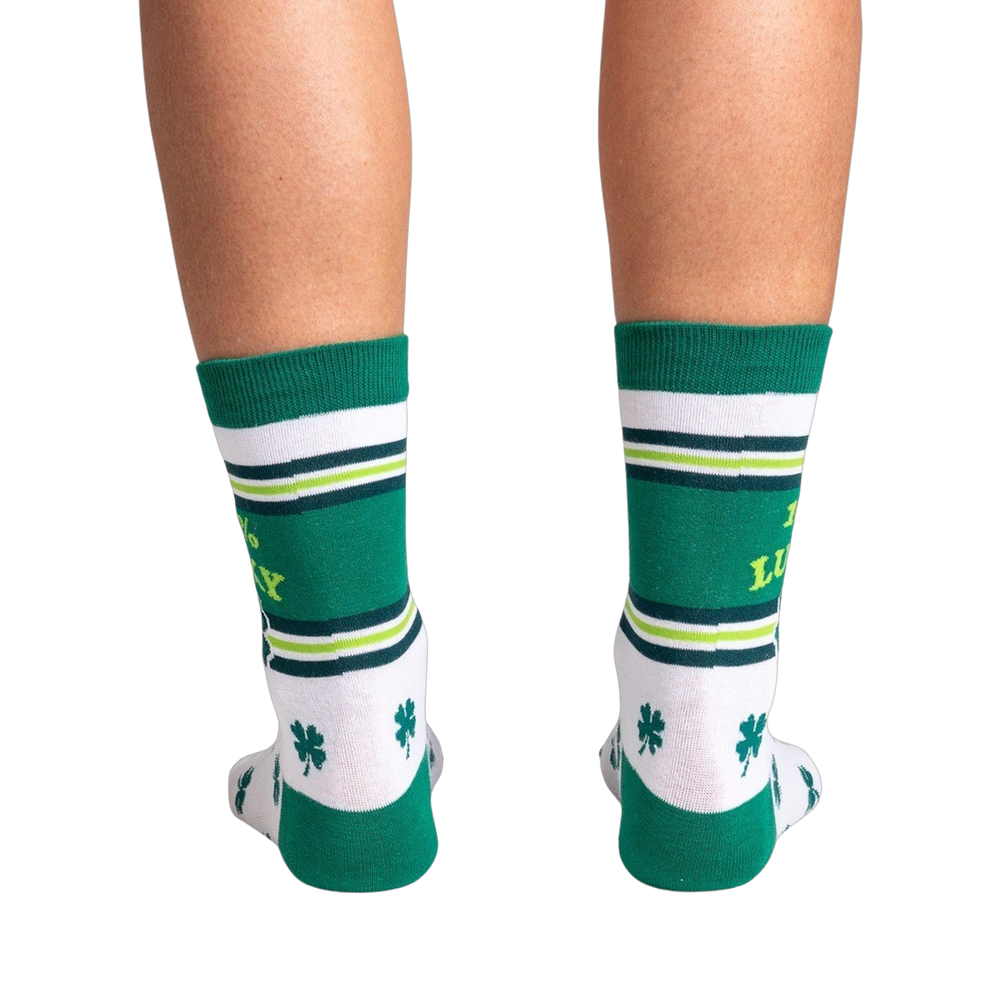 Rear view of the socks on a person's legs.  Shows the back design of the socks against a black background.