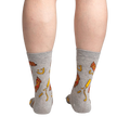 Back view of the socks on a person's legs.