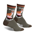Pair of olive green crew socks featuring a corgi wearing glasses sitting on a stack of books.  Red, white, and brown details.