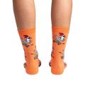 Back view of the Rad Chicken socks on a person's legs, highlighting the design from behind.